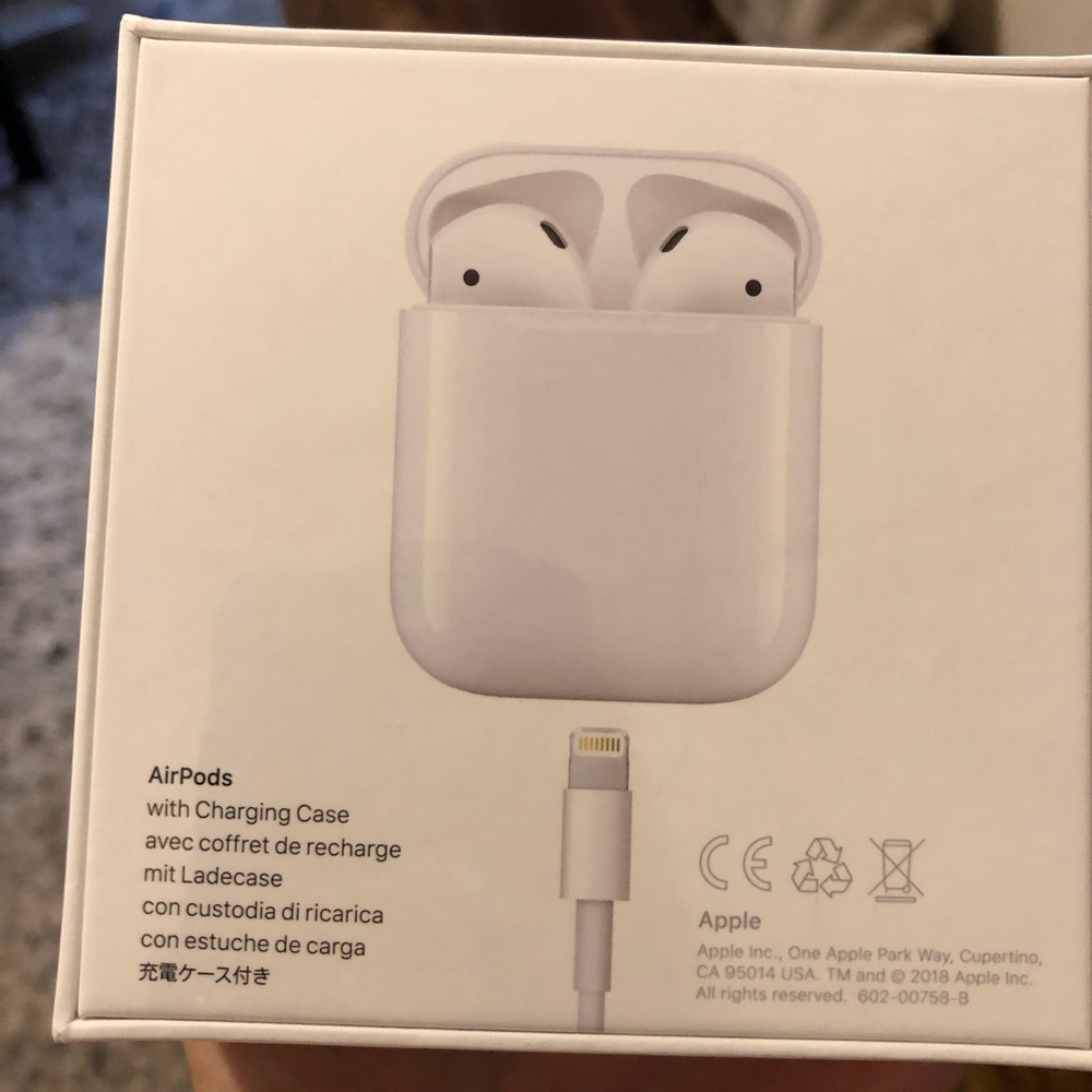 New Apple AirPods with charging case
